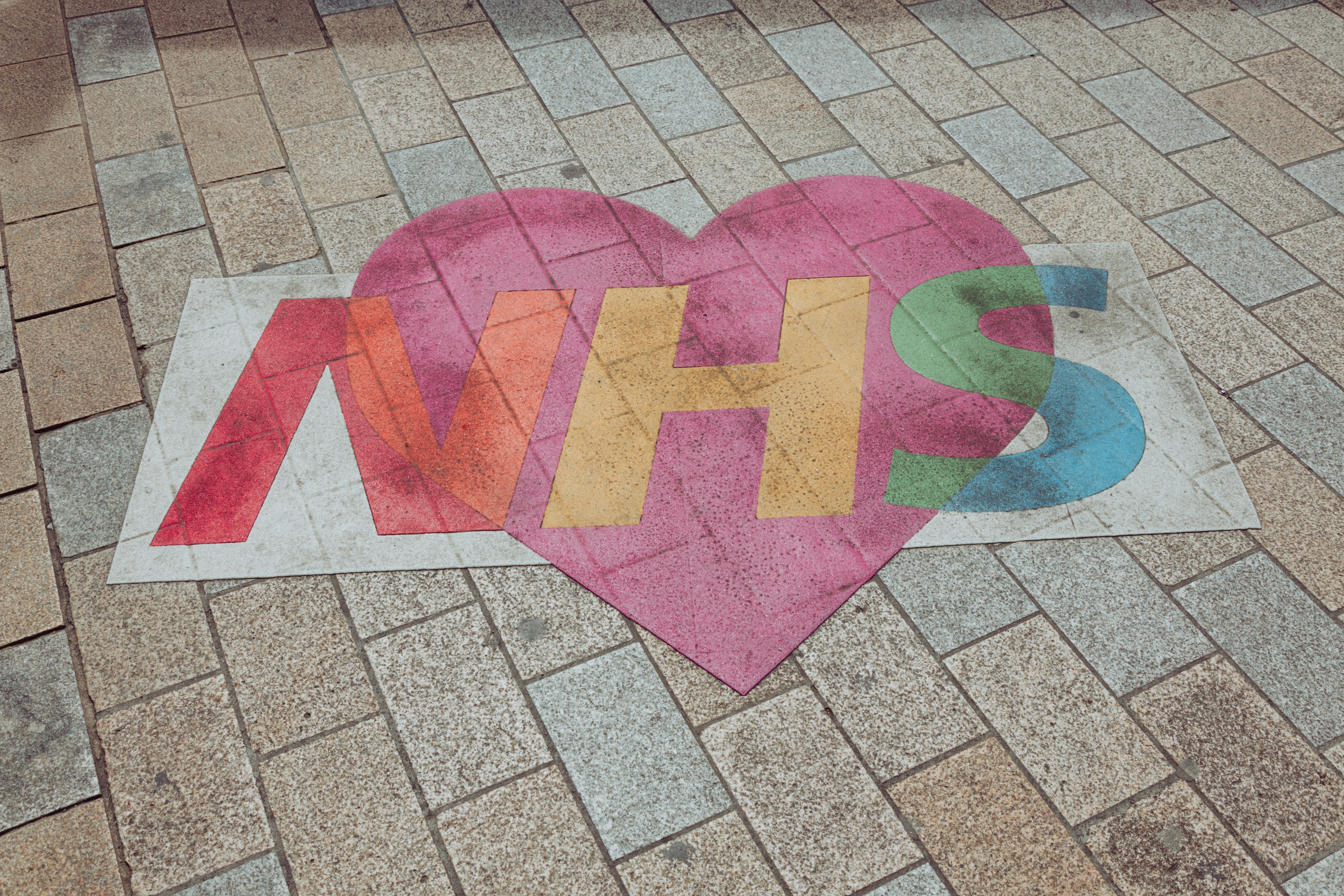 Split comparison showing NHS and private dental practice environments